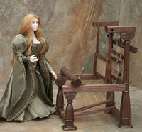 Elizabeth admiring her loom