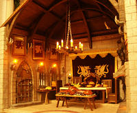 Medieval Room with Hanging Chandelier and Dragon Torches Lit